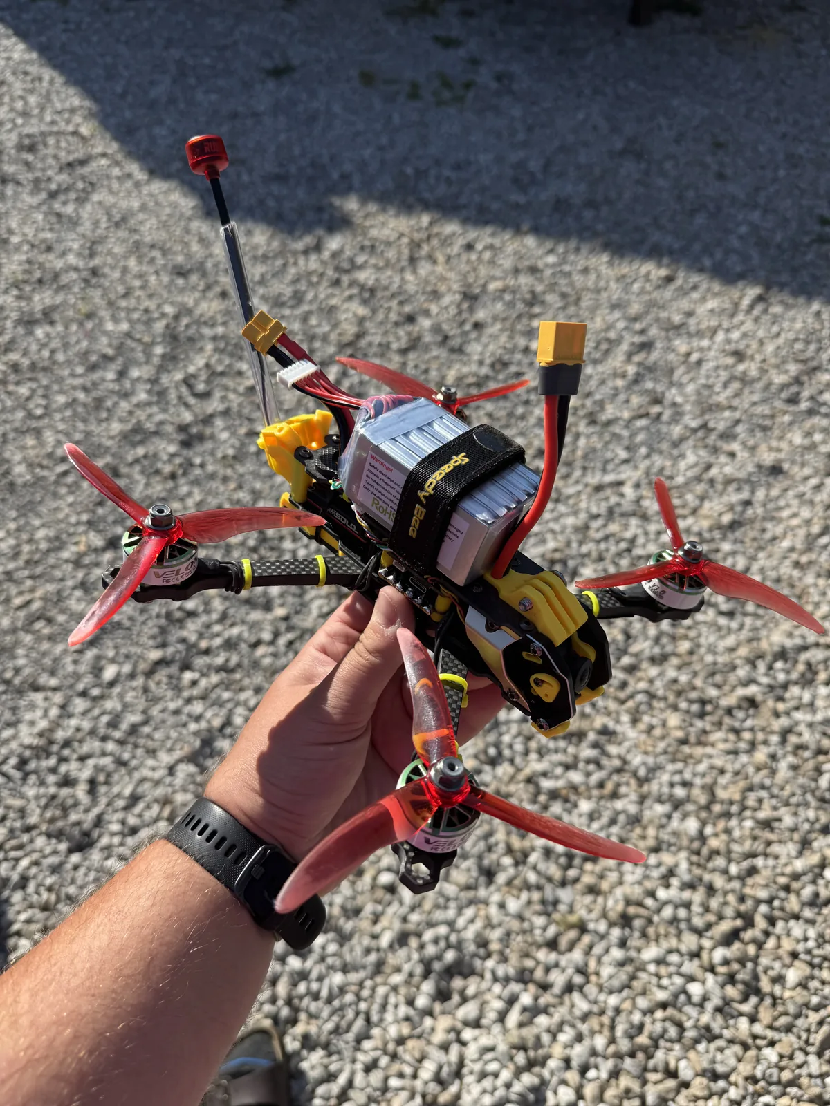 Red and yellow FPV aircraft fitted with a camera